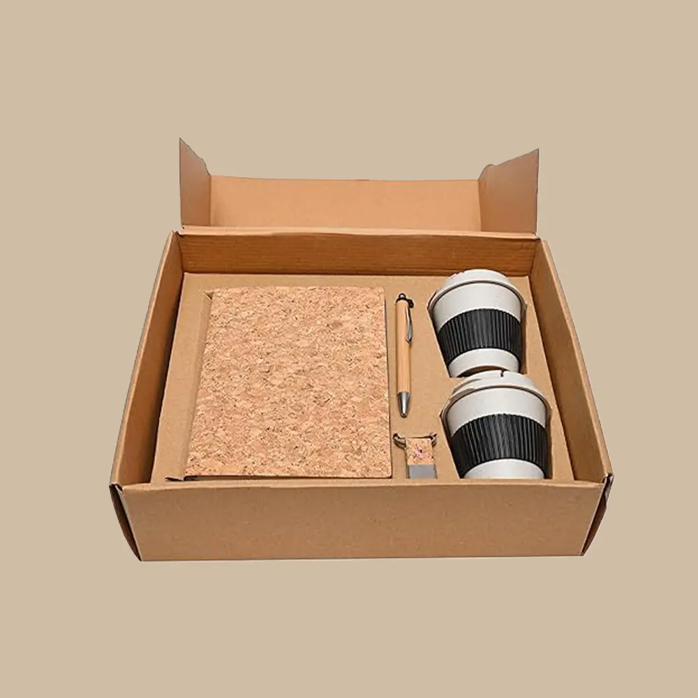 Eco-friendly gift kit with cork notebook, bamboo pen, and reusable cups