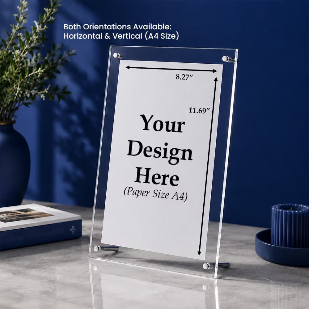 A vertical A4 clear acrylic photo frame with standoff screws, displaying a placeholder insert on a marble tabletop.